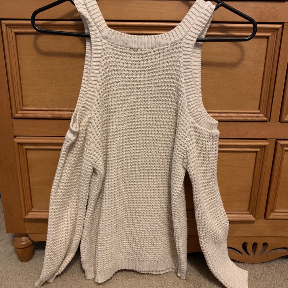Cream sweater.